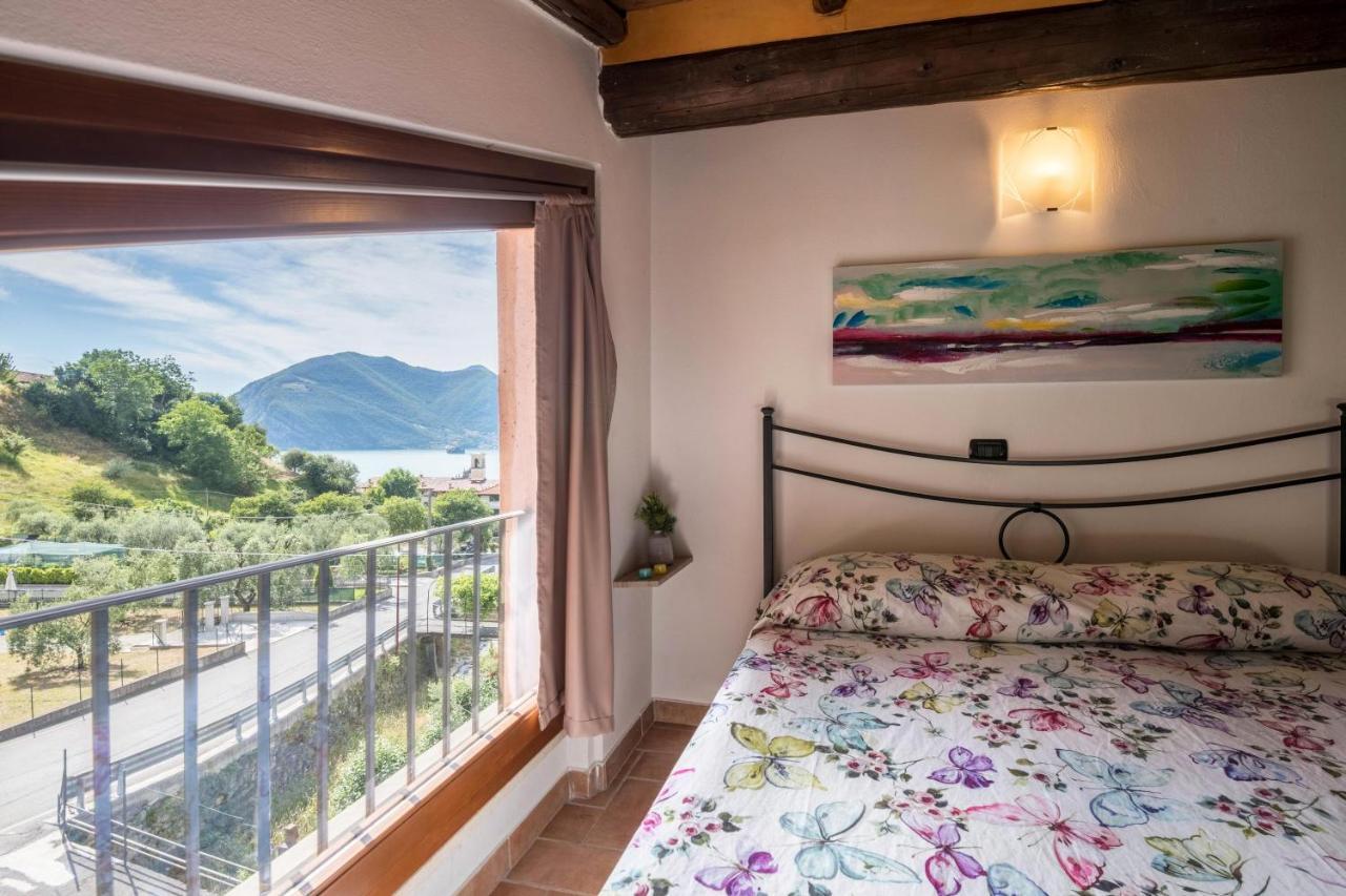 Mansarda Con Vista Lago 苏尔扎诺 外观 照片